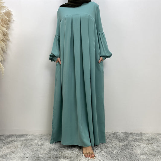 Robe unie à col rond plissé